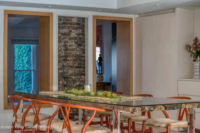 a view of a chair and table in a balcony