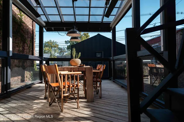 a view of porch with seating area