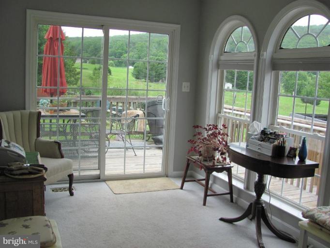 20522 Gapland Road Rohrersville, MD 21779 - Photo 13 of 23 Lovely side sunroom w/beautiful views!