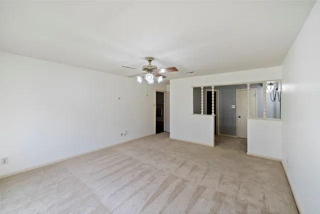 a bathroom with a granite countertop sink mirror and double