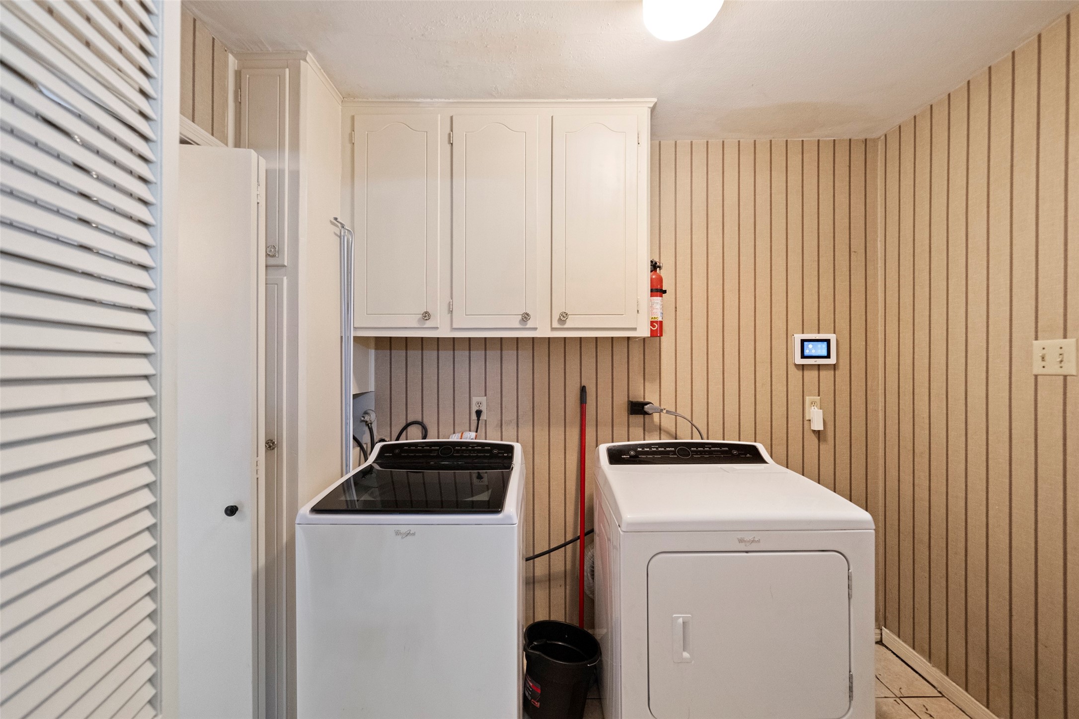 1115 Pear Tree Lane Houston, TX 77073 - Photo 22 of 30 a utility room with dryer and washer