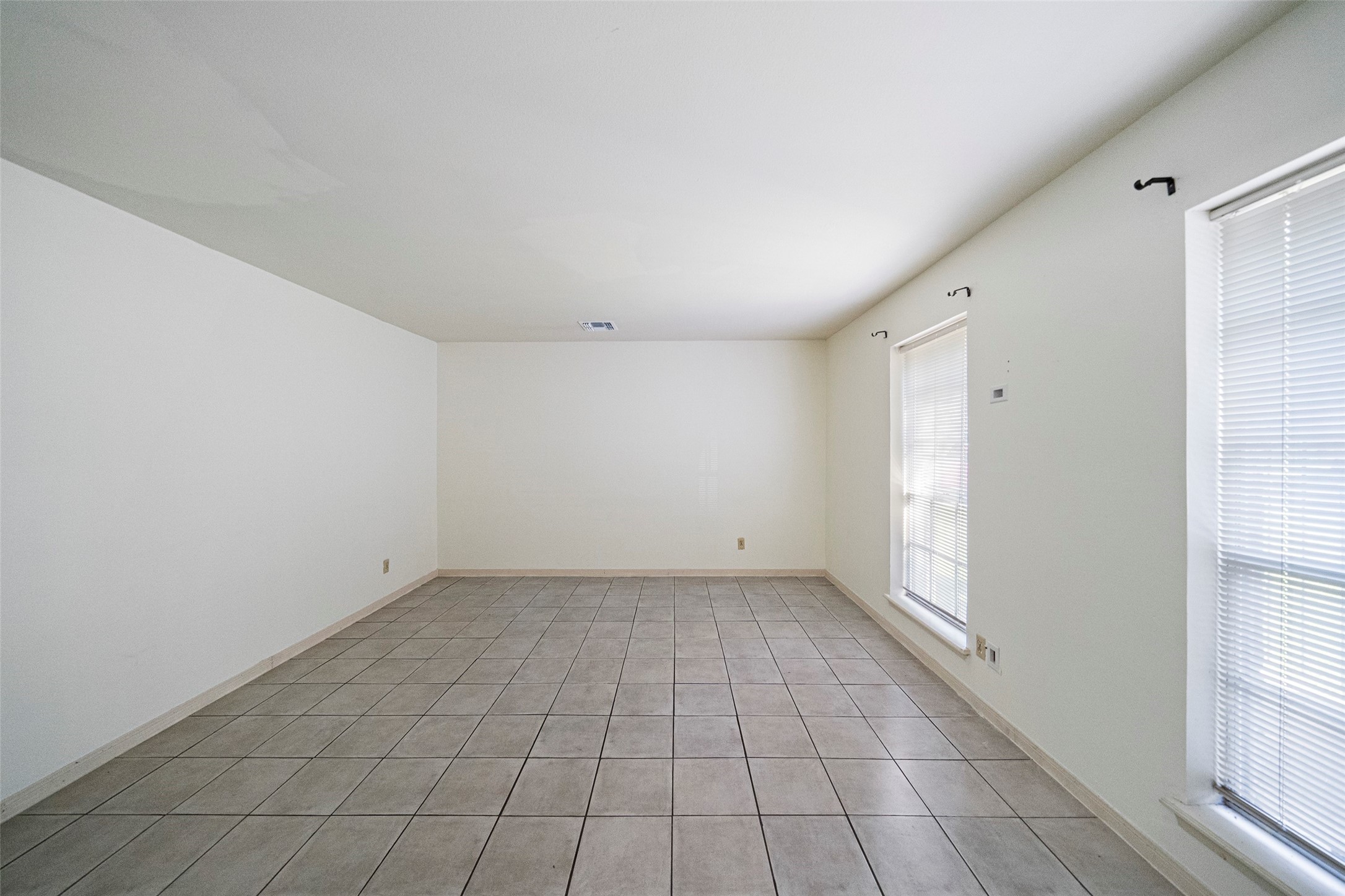 1115 Pear Tree Lane Houston, TX 77073 - Photo 5 of 30 a view of an empty room and window