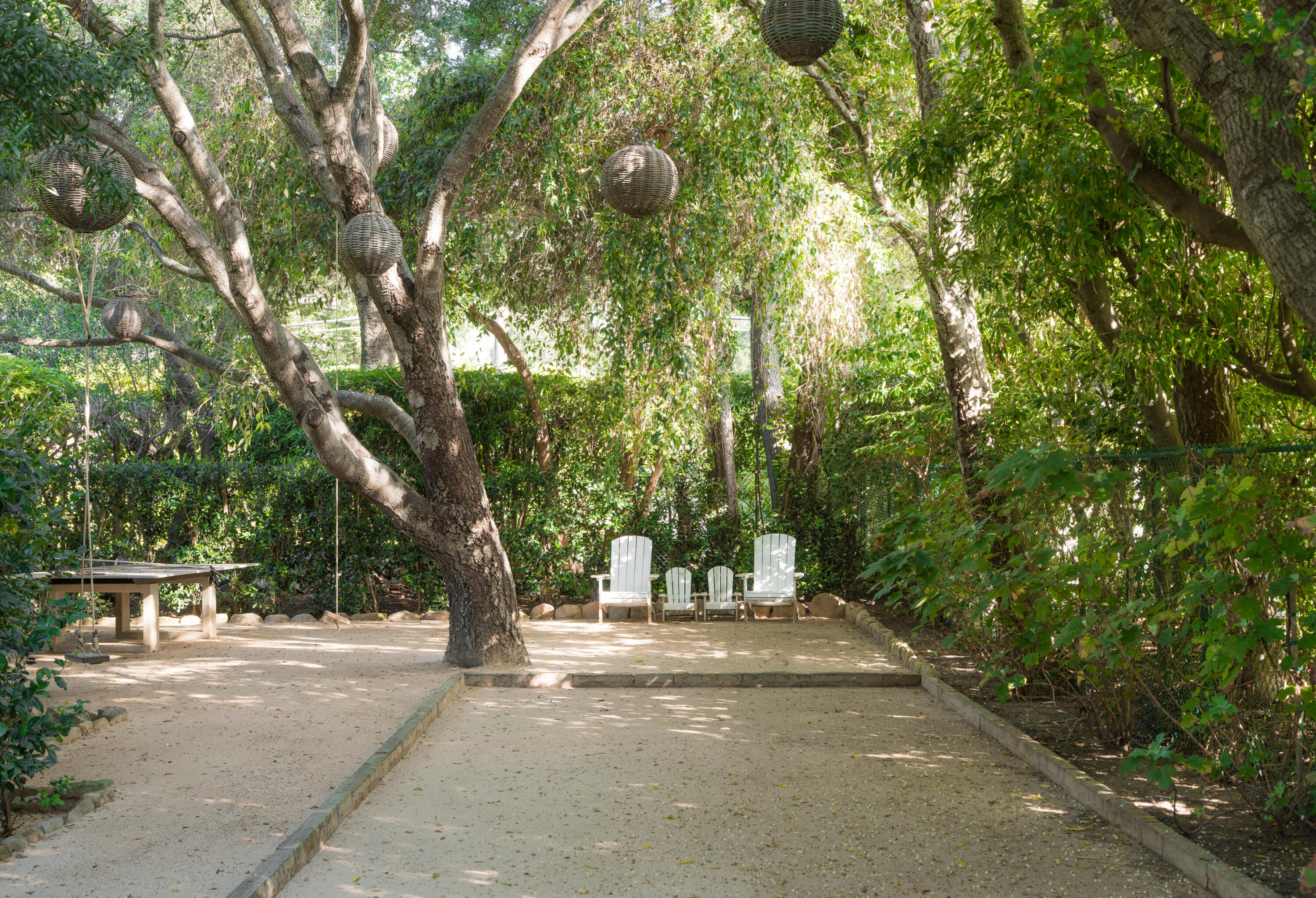 1567 East Valley Road Montecito, CA 93108 - Photo 31 of 34 Bocce Court Area under Oaks