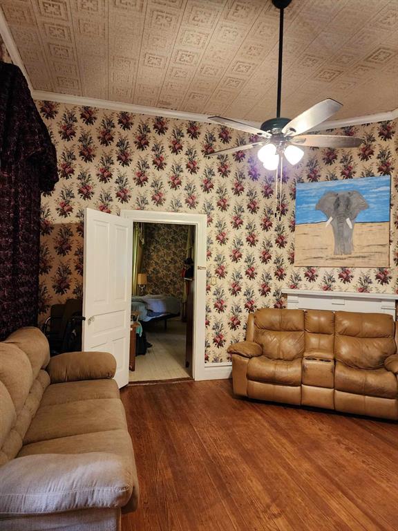 205 South 2nd Street Logansport, LA 71049 - Photo 20 of 36 a living room with furniture and a fireplace