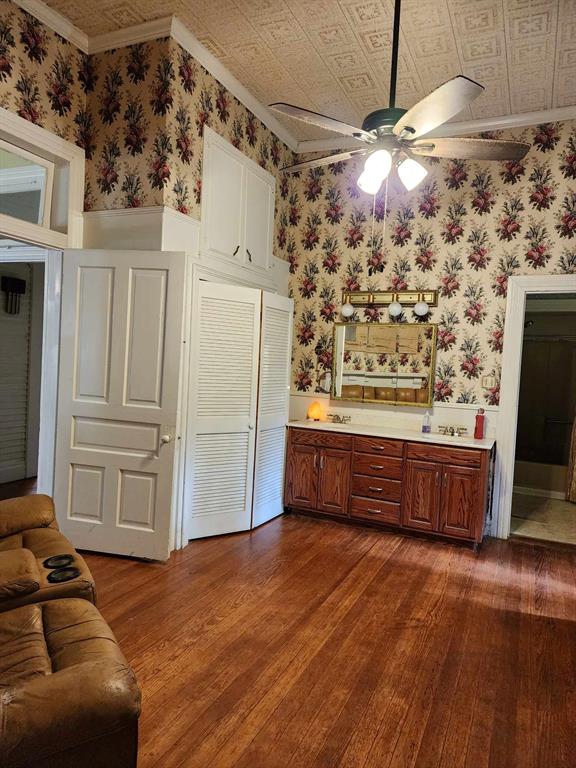 205 South 2nd Street Logansport, LA 71049 - Photo 32 of 36 a living room with stainless steel appliances kitchen island granite countertop a refrigerator and a stove top oven