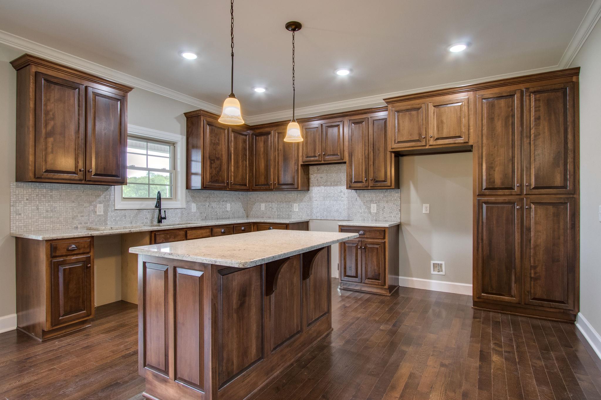 1634 Goshen Road Lebanon, TN 37087 - Photo 8 of 23 $3,500 appliance allowance for the new homeowner*Granite counters and tile back splash