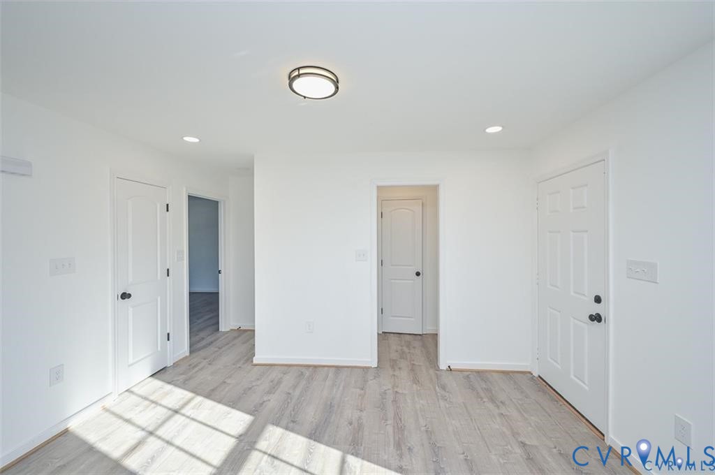 26471 Slash Pine Circle Ruther Glen, VA 22546 - Photo 11 of 36 a view of hallway with wooden floor