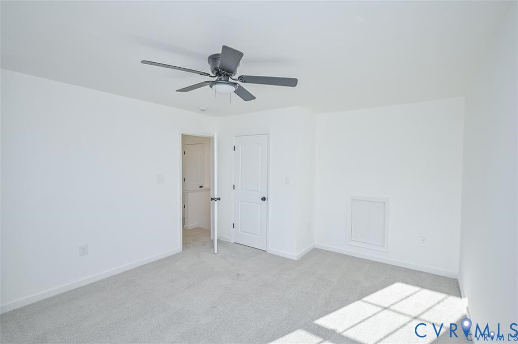 26471 Slash Pine Circle Ruther Glen, VA 22546 - Photo 25 of 36 a view of room window and a ceiling fan