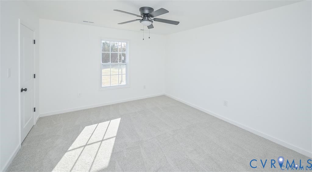 26471 Slash Pine Circle Ruther Glen, VA 22546 - Photo 27 of 36 a view of empty room with windows