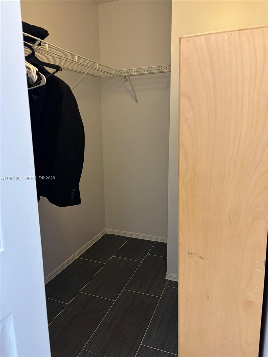 2907 Southeast 15th Terrace Homestead, FL 33035 - Photo 15 of 30 a view of a walk in closet