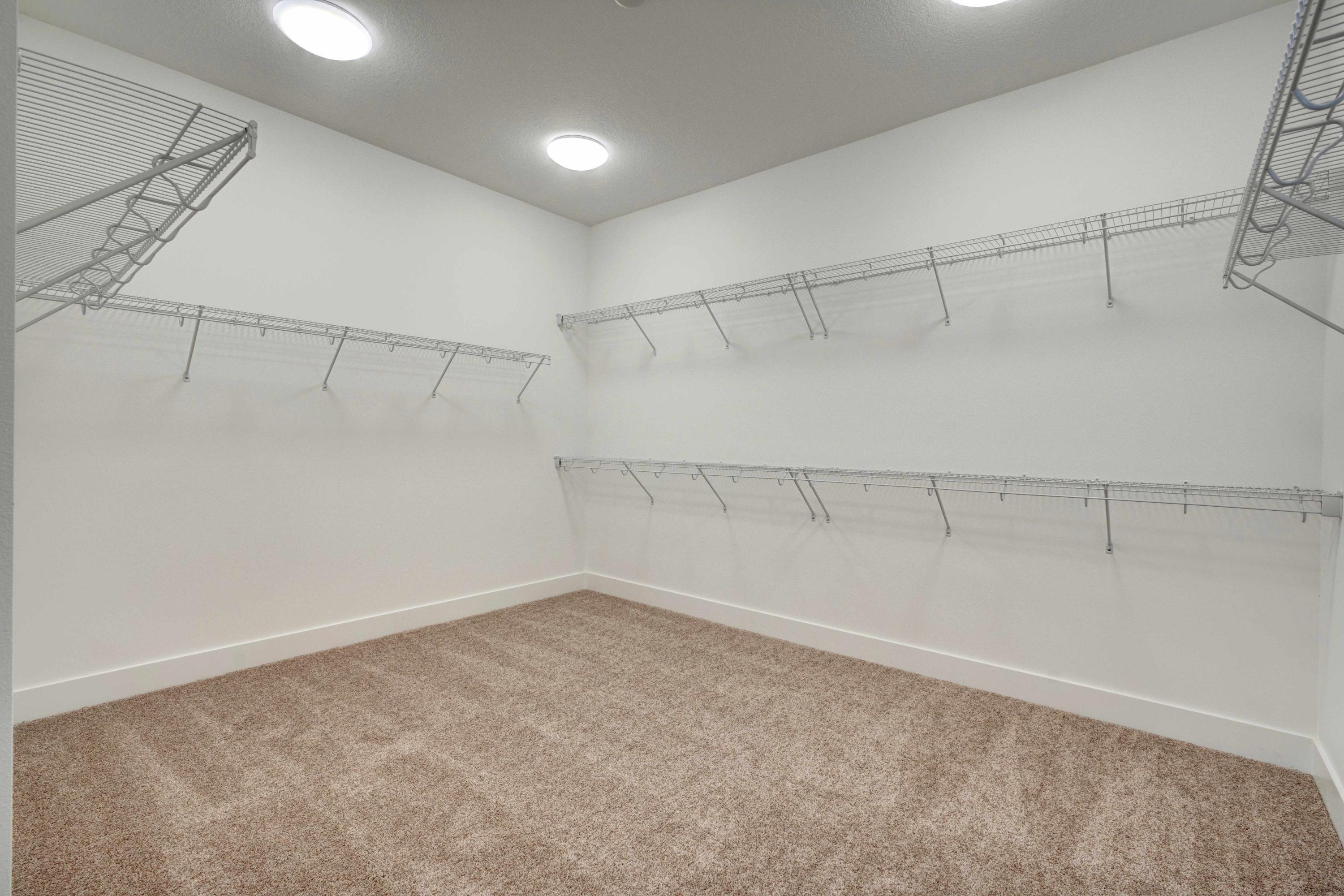13221 Alton Road Palm Beach Gardens, FL 33418 - Photo 22 of 54 Master walk-in closet