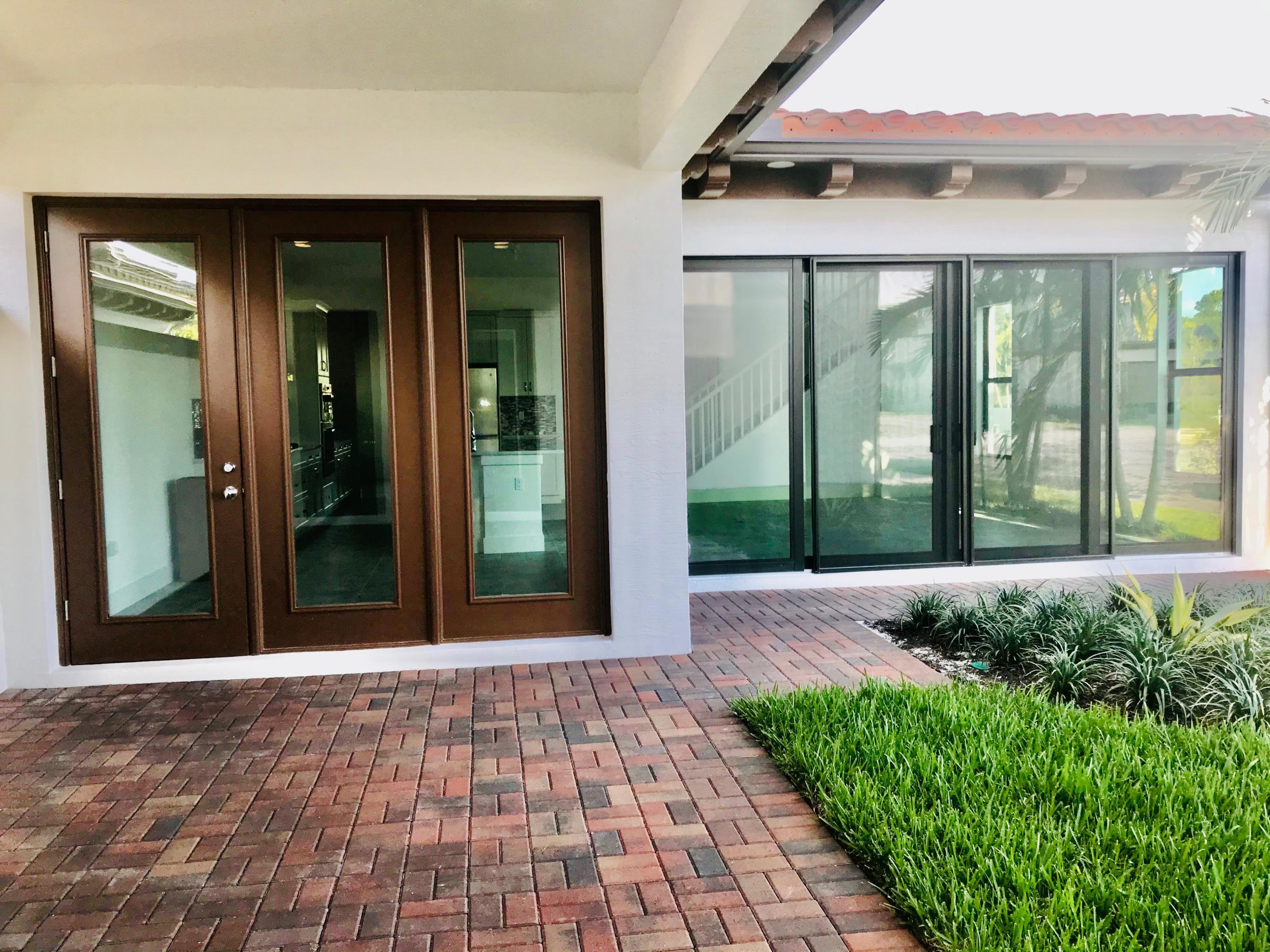 13221 Alton Road Palm Beach Gardens, FL 33418 - Photo 31 of 54 back patio