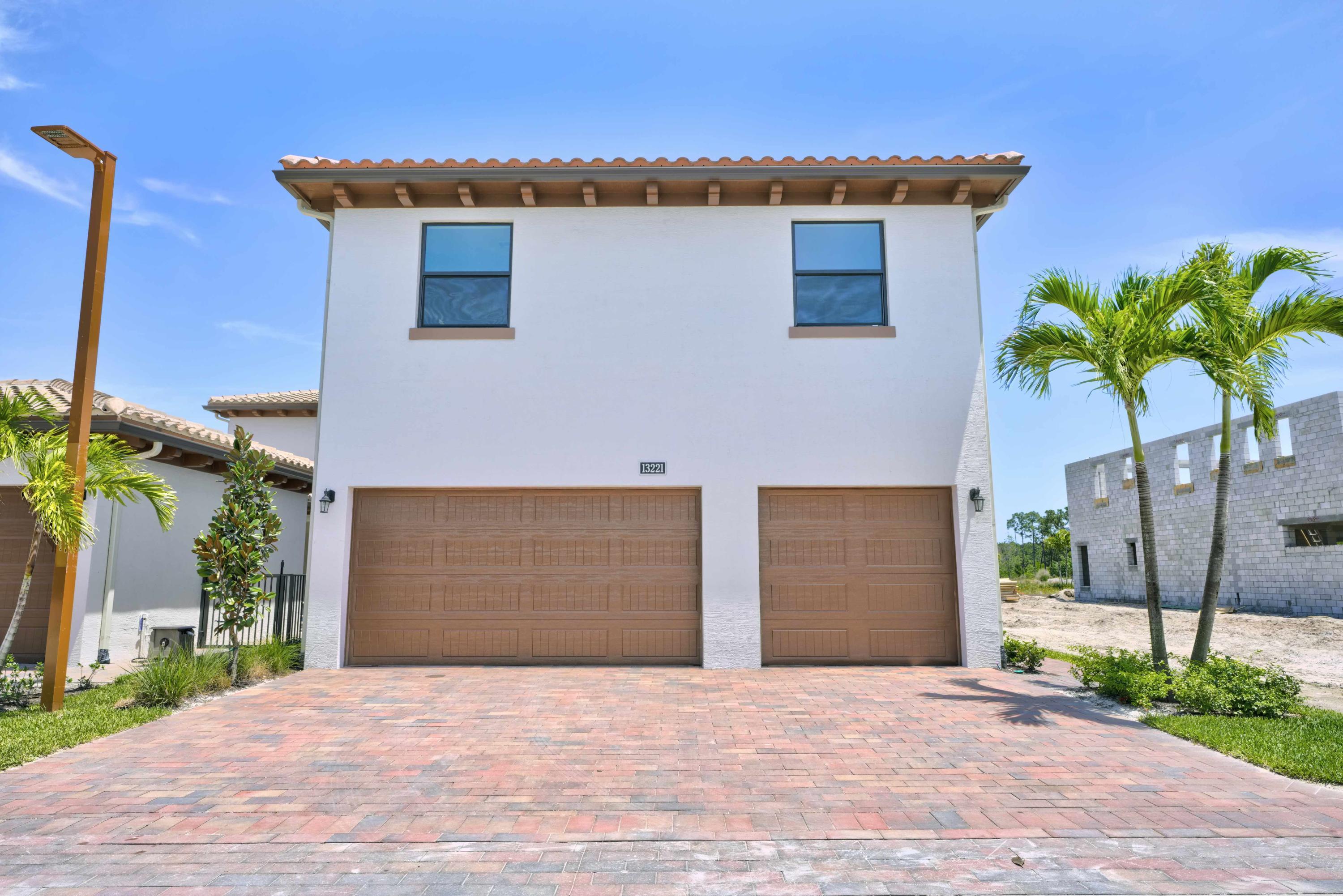 13221 Alton Road Palm Beach Gardens, FL 33418 - Photo 34 of 54 backgarage