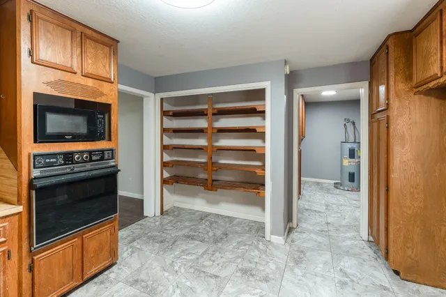 a view of a livingroom with a fireplace