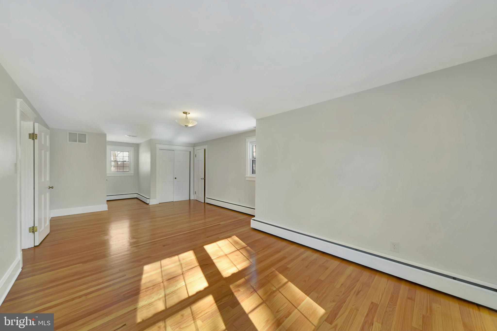 2675 Jolly Acres Road White Hall, MD 21161 - Photo 17 of 50 a view of empty room with wooden floor