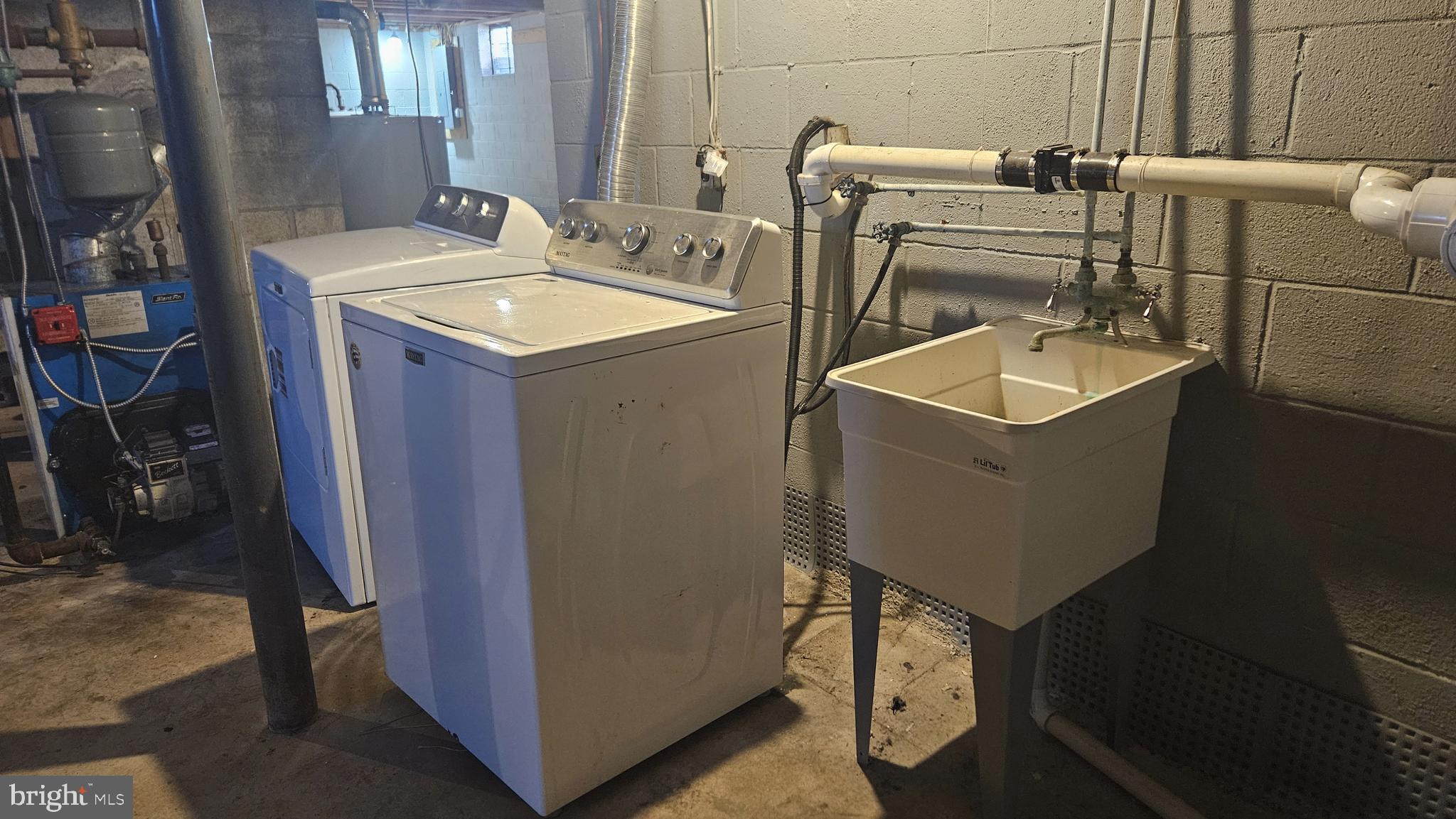 2675 Jolly Acres Road White Hall, MD 21161 - Photo 30 of 50 a utility room with dryer and washer