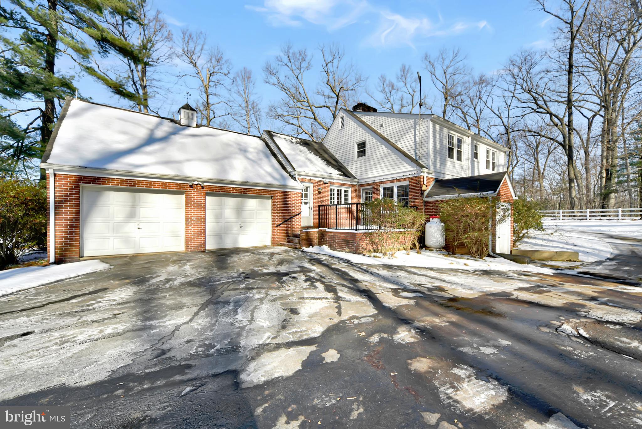 2675 Jolly Acres Road White Hall, MD 21161 - Photo 39 of 50 a view of a house with a yard and garage