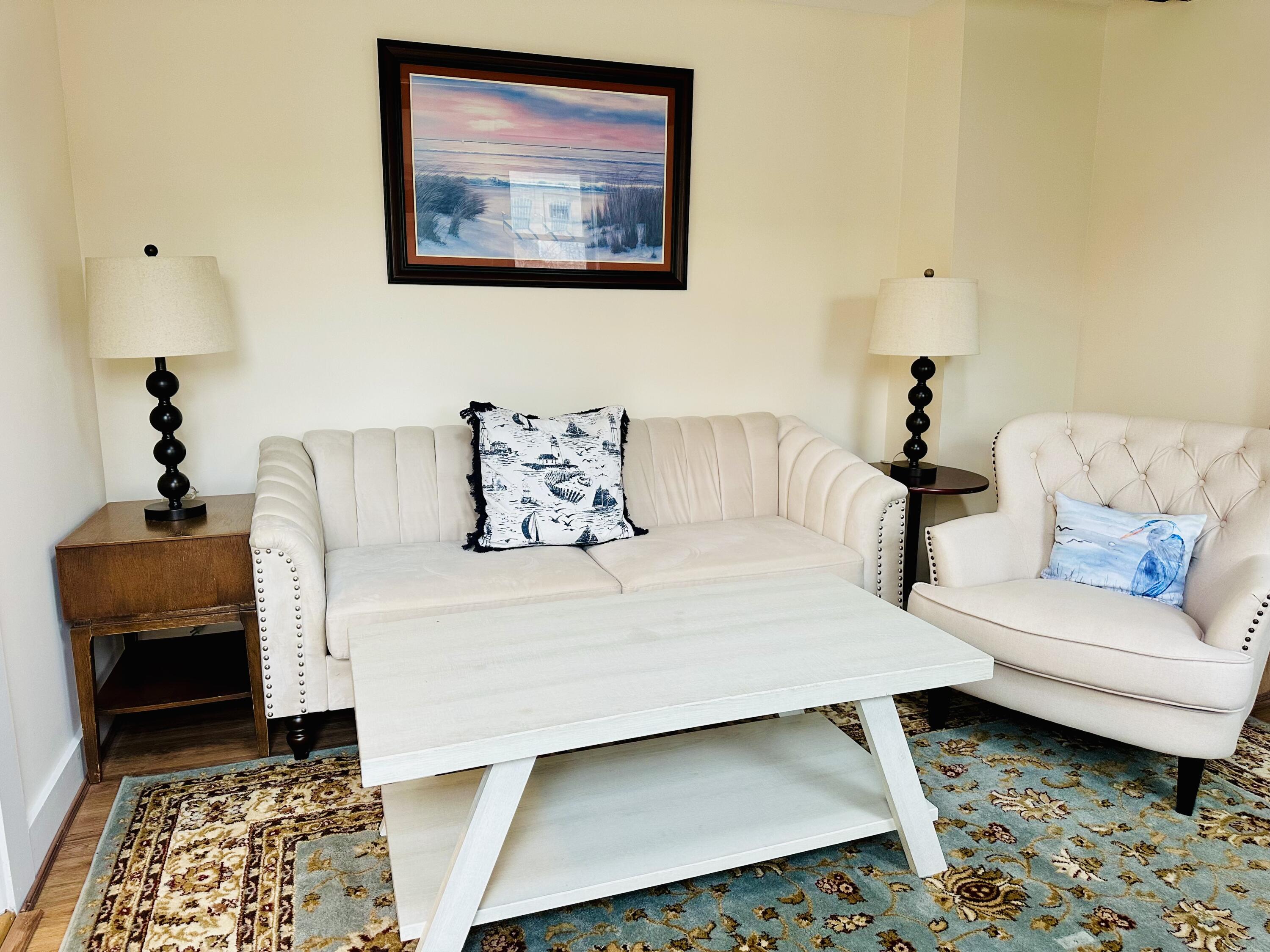 36 Cove Road Wellfleet, MA 02667 - Photo 9 of 22 a bedroom with a bed and a couch