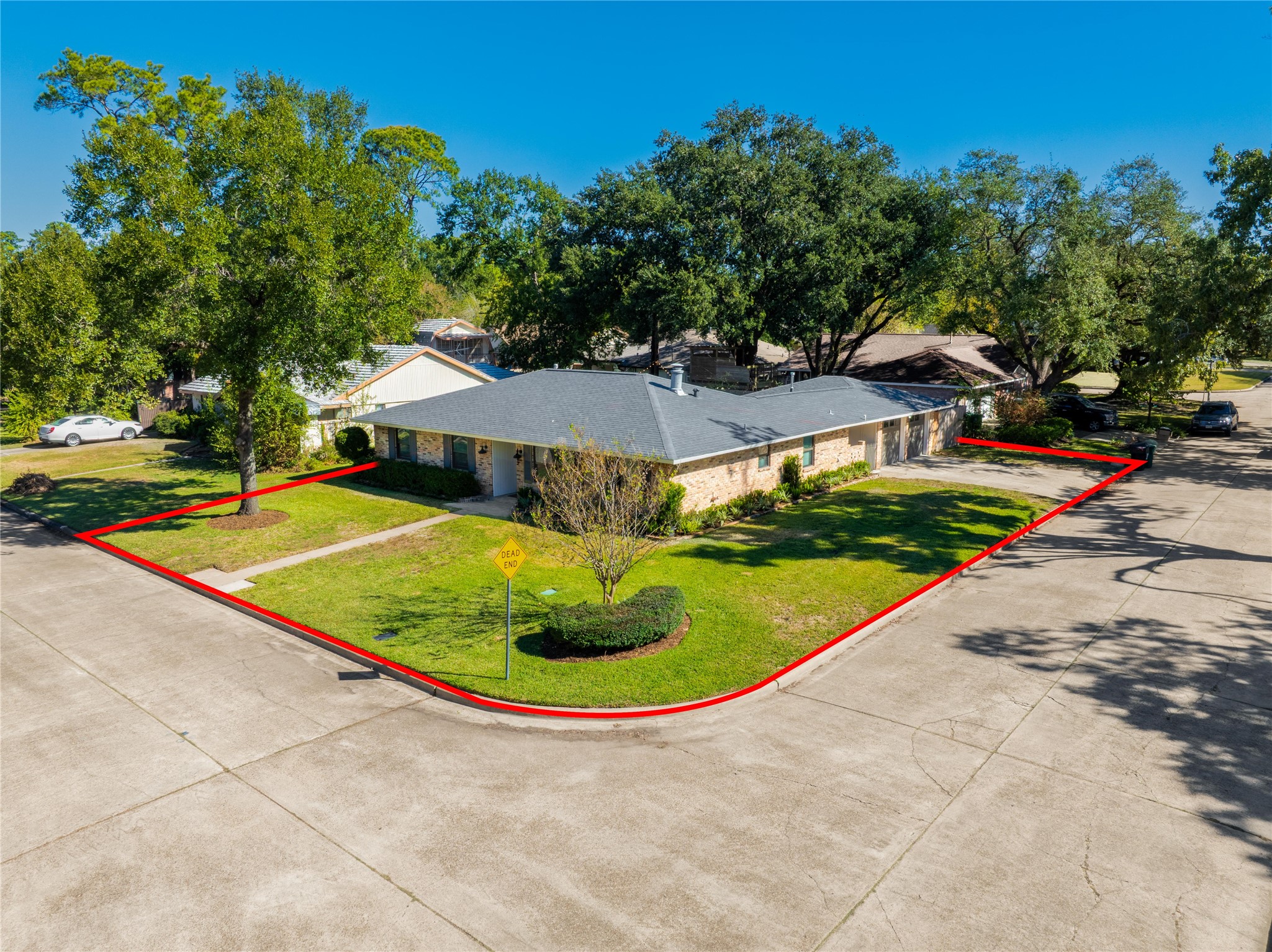 4402 Fallbrook Drive Houston, TX 77018 - Photo 27 of 29 Angled aerial view highlighting the spacious corner lot and full property boundaries.