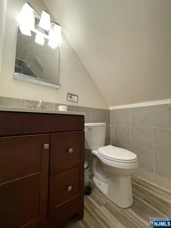 a bathroom with a toilet and a sink