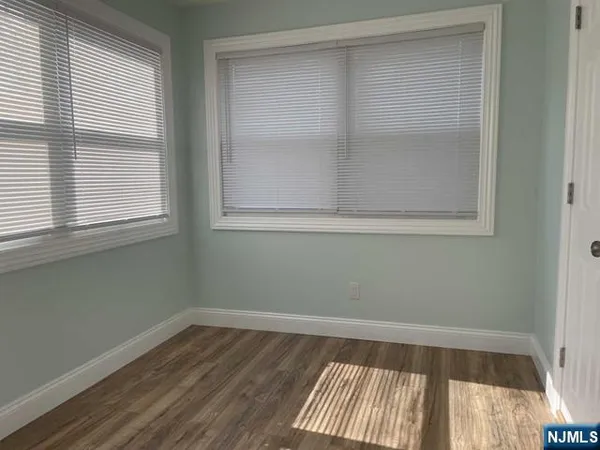 a view of a room that has a window