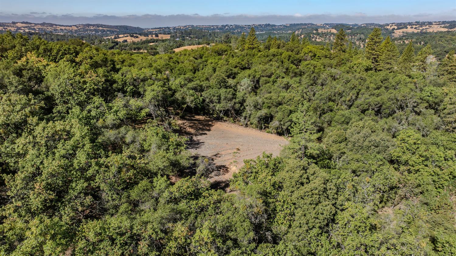 16300 Rossbridge Road Jackson, CA 95642 - Photo 11 of 40 an aerial view of a houses with a yard and mountain view