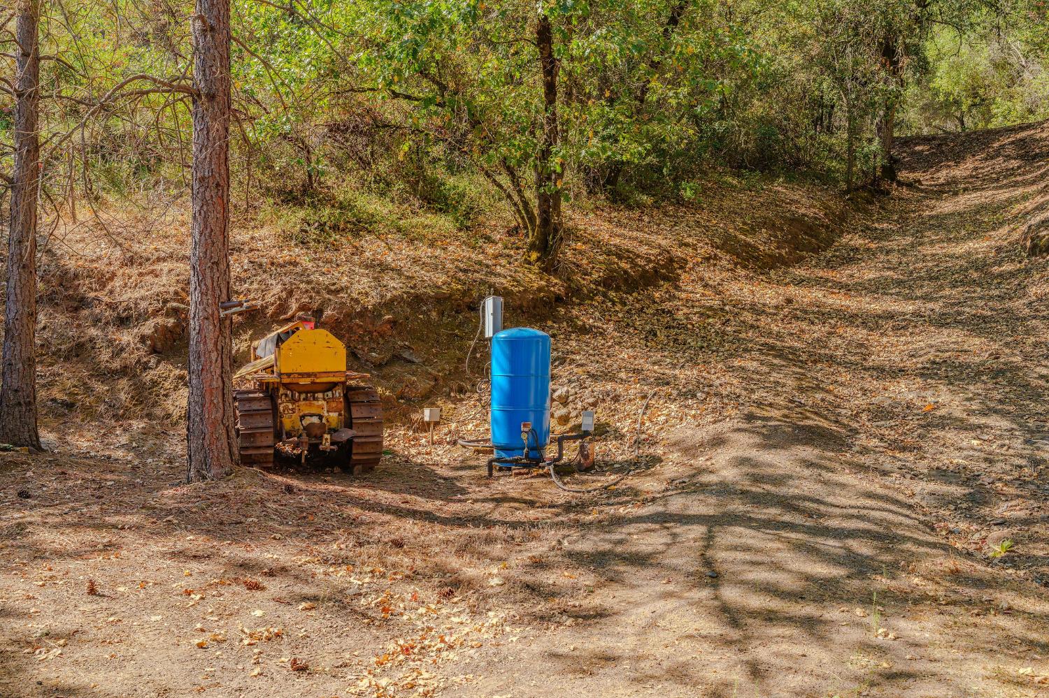 16300 Rossbridge Road Jackson, CA 95642 - Photo 2 of 40 a view of a outdoor space with a car parked beside it