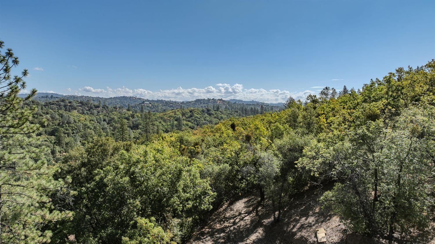 16300 Rossbridge Road Jackson, CA 95642 - Photo 29 of 40 a view of a mountain from a yard
