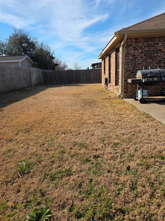 213 Independence Trail Forney, TX 75126 - Photo 17 of 17 a view of a house with a yard