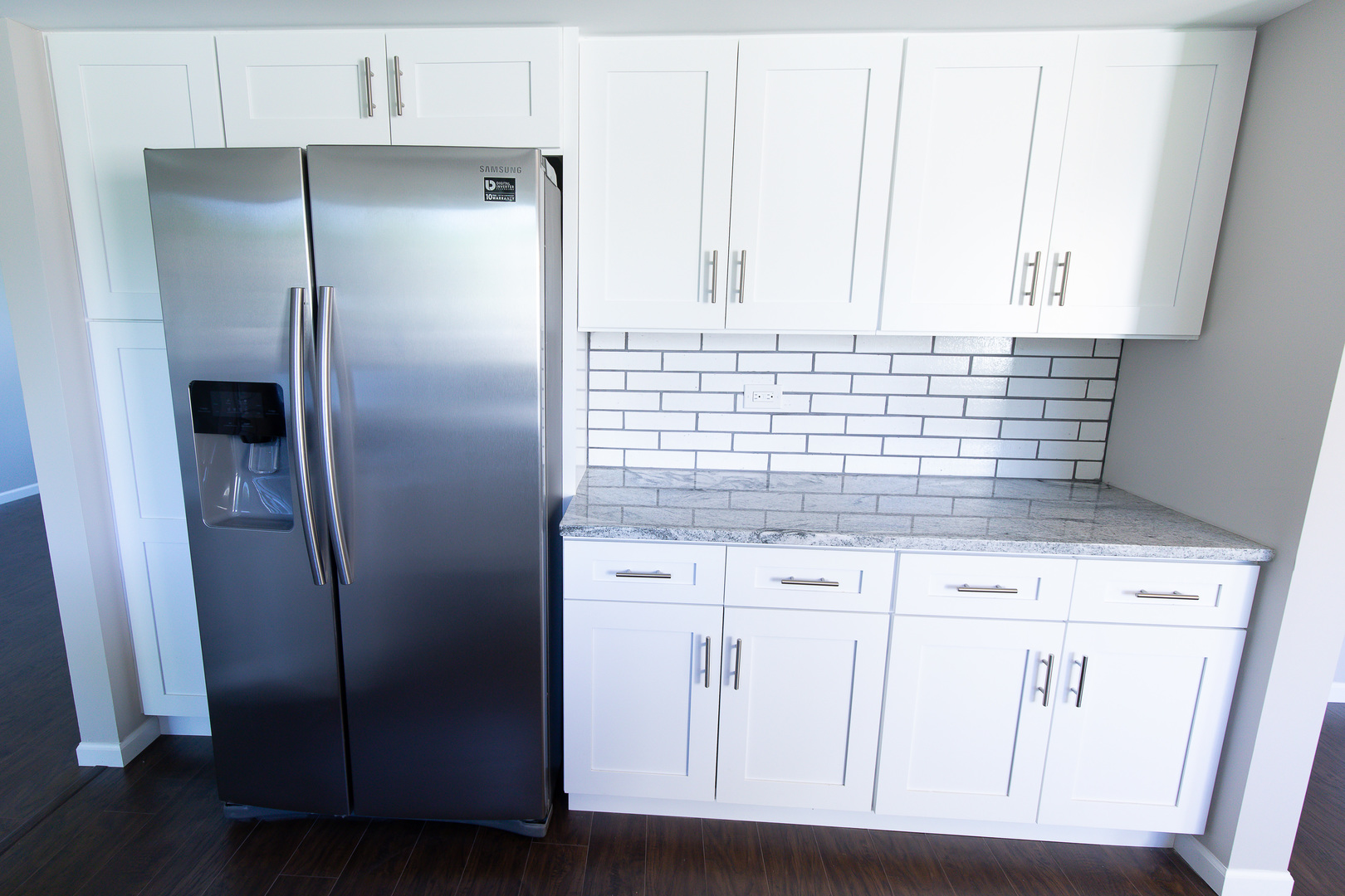 56 White Oaks Road Matteson, IL 60443 - Photo 7 of 20 a kitchen with stainless steel appliances white cabinets and a refrigerator
