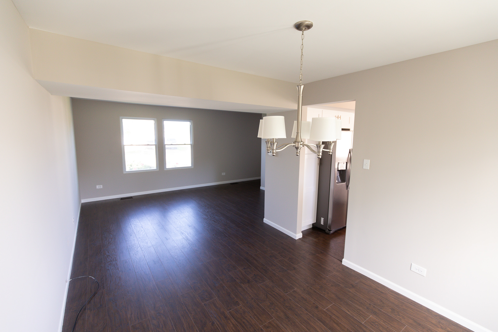 56 White Oaks Road Matteson, IL 60443 - Photo 10 of 20 a view of a room with wooden floor and windows
