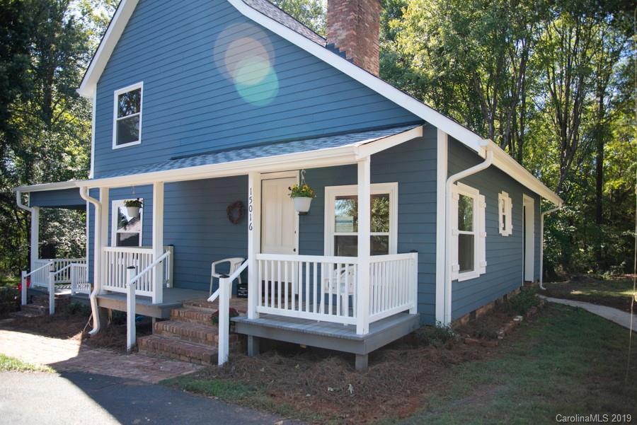 15016 Ranson Road Huntersville, NC 28078 - Photo 2 of 27 a view of a house with a yard and deck