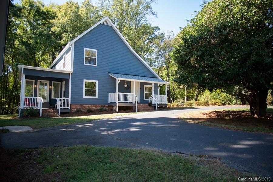 15016 Ranson Road Huntersville, NC 28078 - Photo 26 of 27 a front view of a house with yard and green space