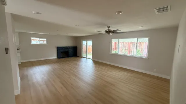 a kitchen with a stove and a refrigerator