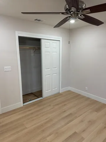 a view of a garage room and a window
