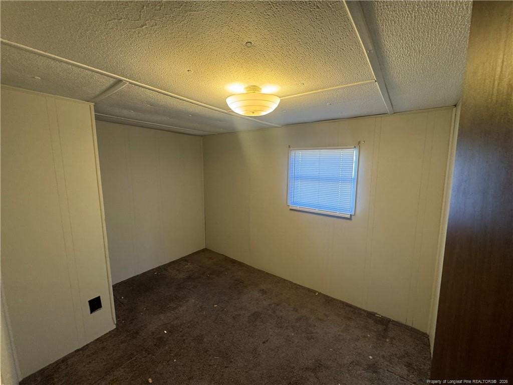 1738 Strickland Bridge Road Fayetteville, NC 28304 - Photo 7 of 9 a view of an empty room with a window