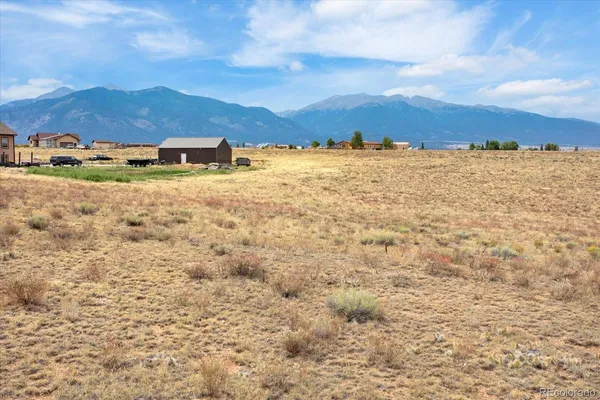 a view of mountain and an outdoor space