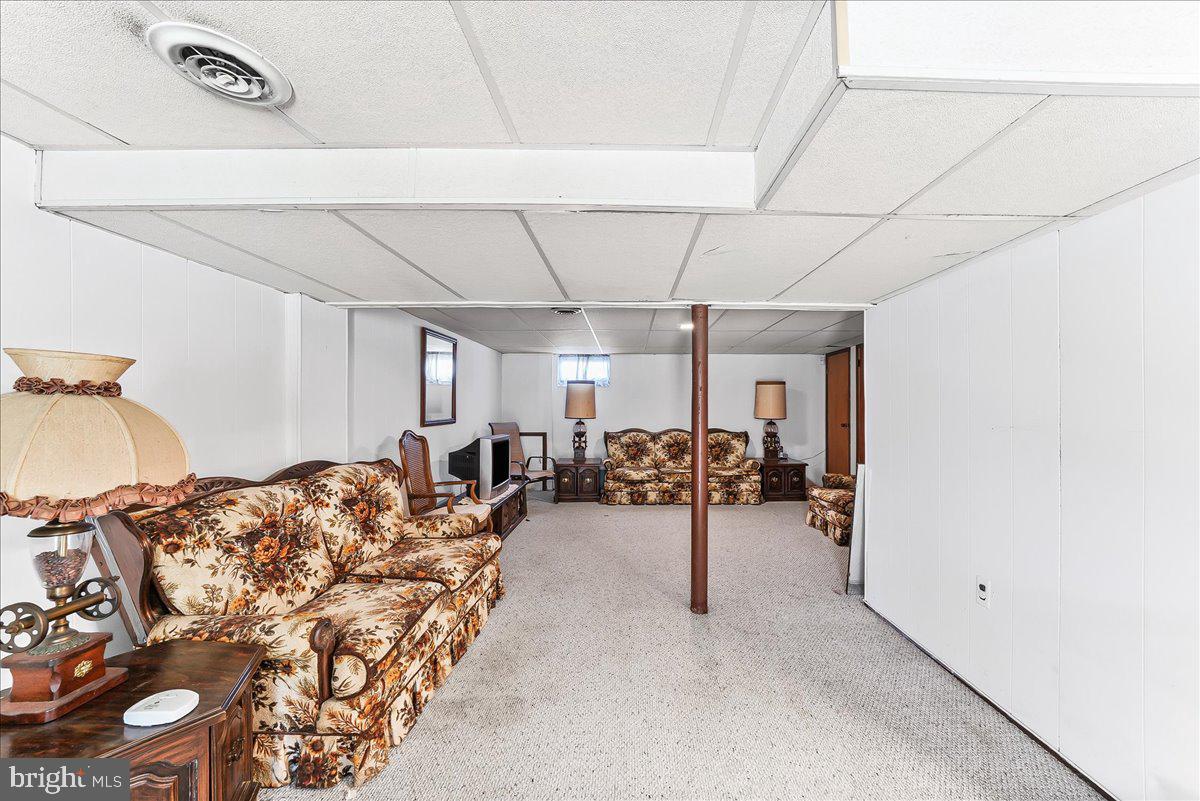 15 Colonial Circle Aston, PA 19014 - Photo 21 of 30 a view of a livingroom with furniture and a window