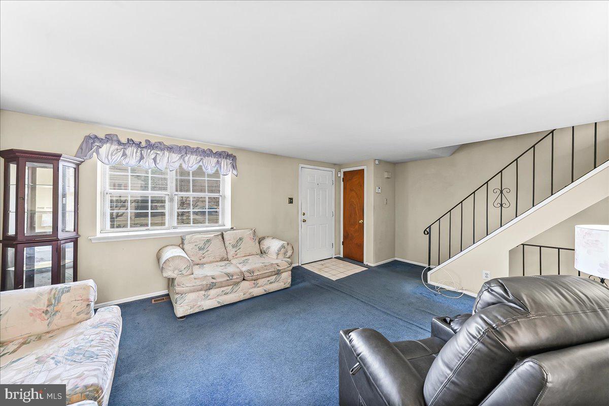 15 Colonial Circle Aston, PA 19014 - Photo 4 of 30 a living room with furniture and a window