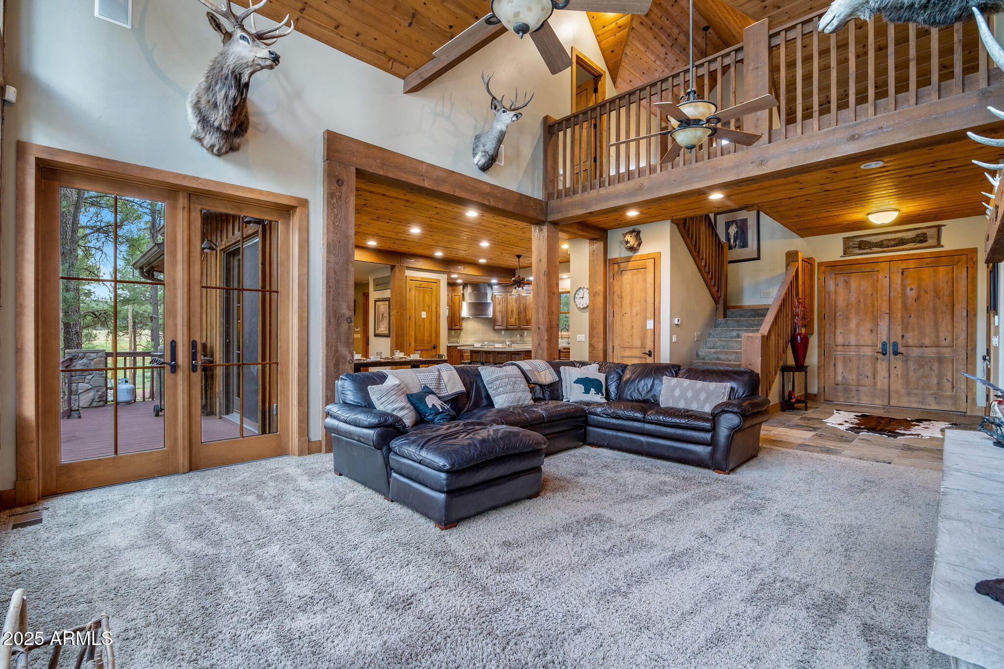 36 County Road N2147 Alpine, AZ 85920 - Photo 11 of 47 a outdoor living space with furniture and a ceiling fan
