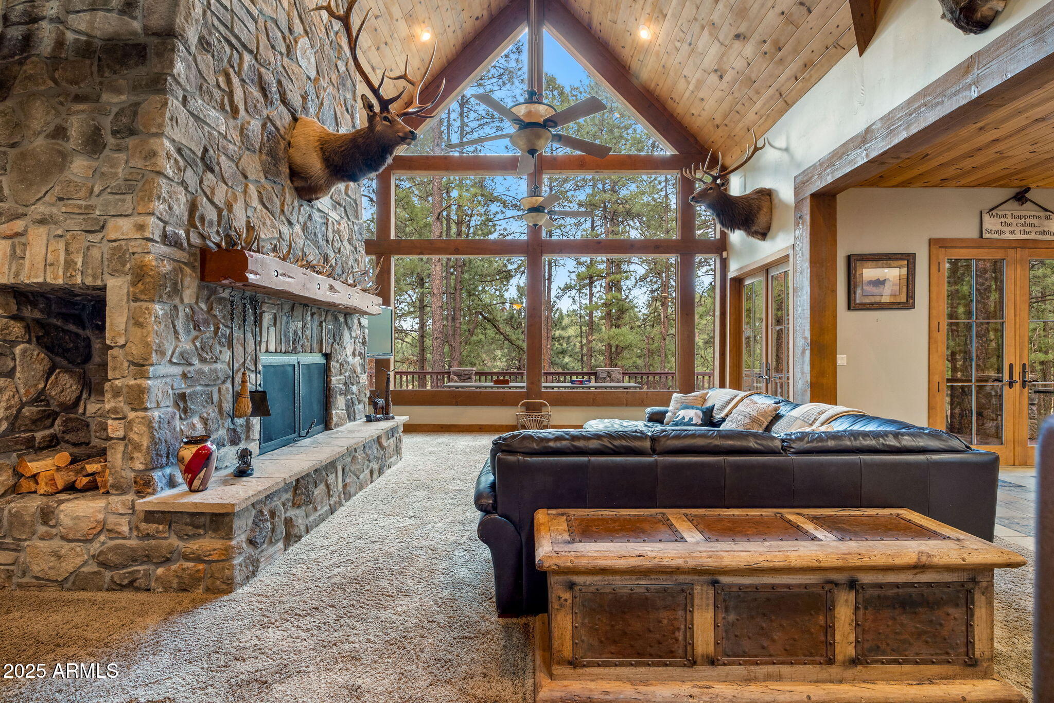 36 County Road N2147 Alpine, AZ 85920 - Photo 12 of 47 a living room with a couch and a table
