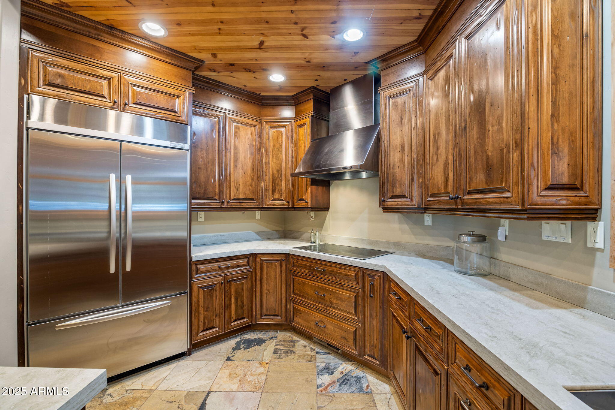 36 County Road N2147 Alpine, AZ 85920 - Photo 15 of 47 a kitchen with stainless steel appliances granite countertop a refrigerator and a sink