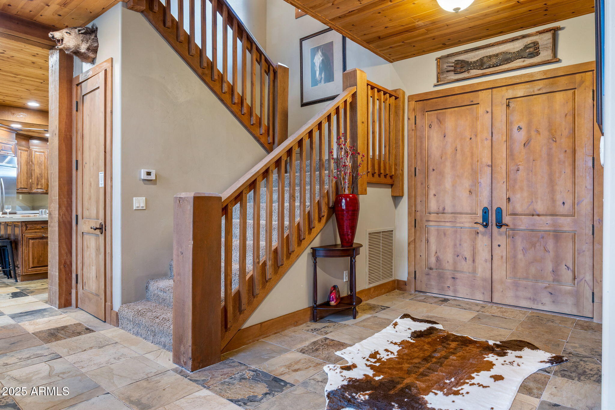 36 County Road N2147 Alpine, AZ 85920 - Photo 22 of 47 a view of a hallway with wooden floor and staircase