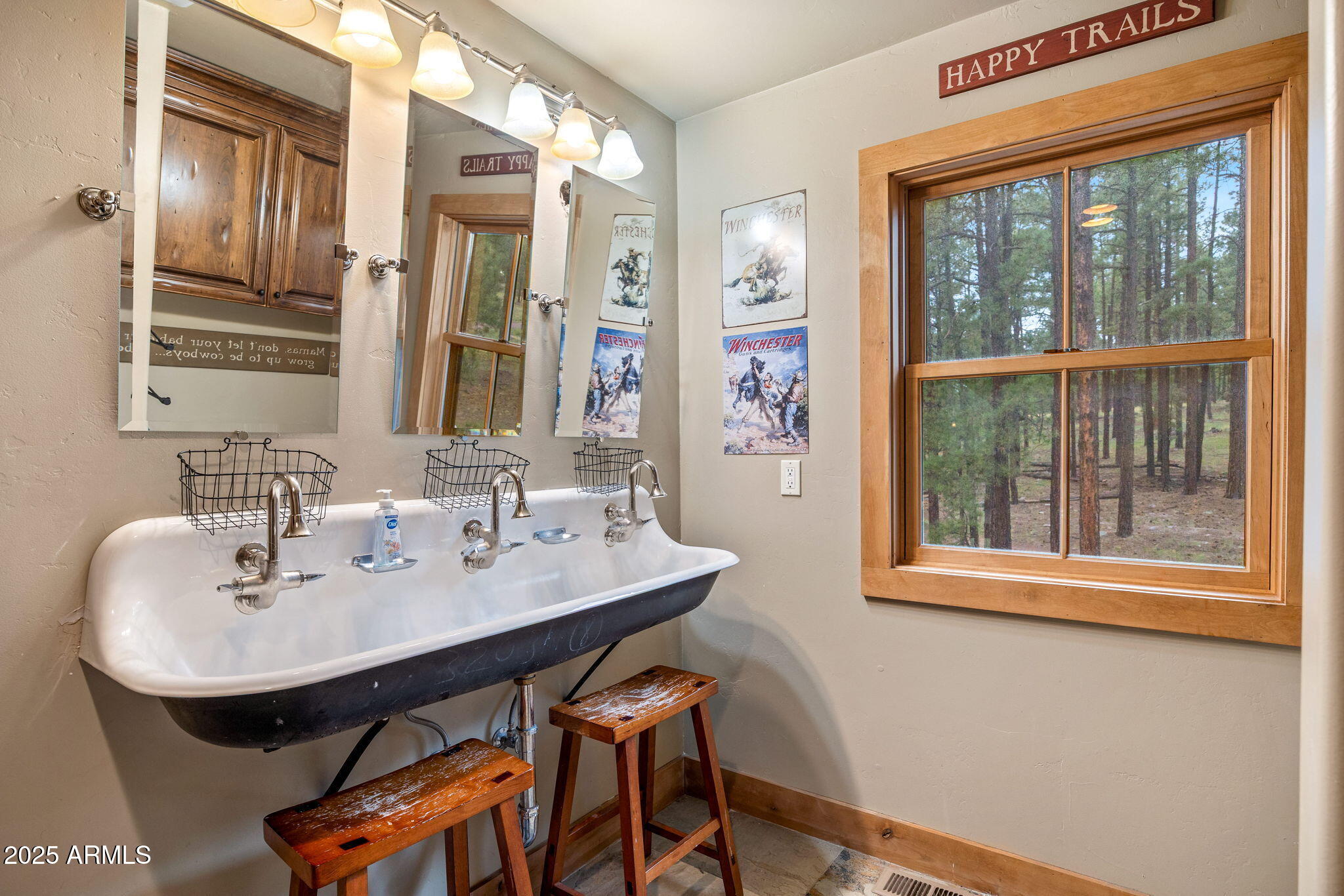 36 County Road N2147 Alpine, AZ 85920 - Photo 26 of 47 a bathroom with a sink and a mirror