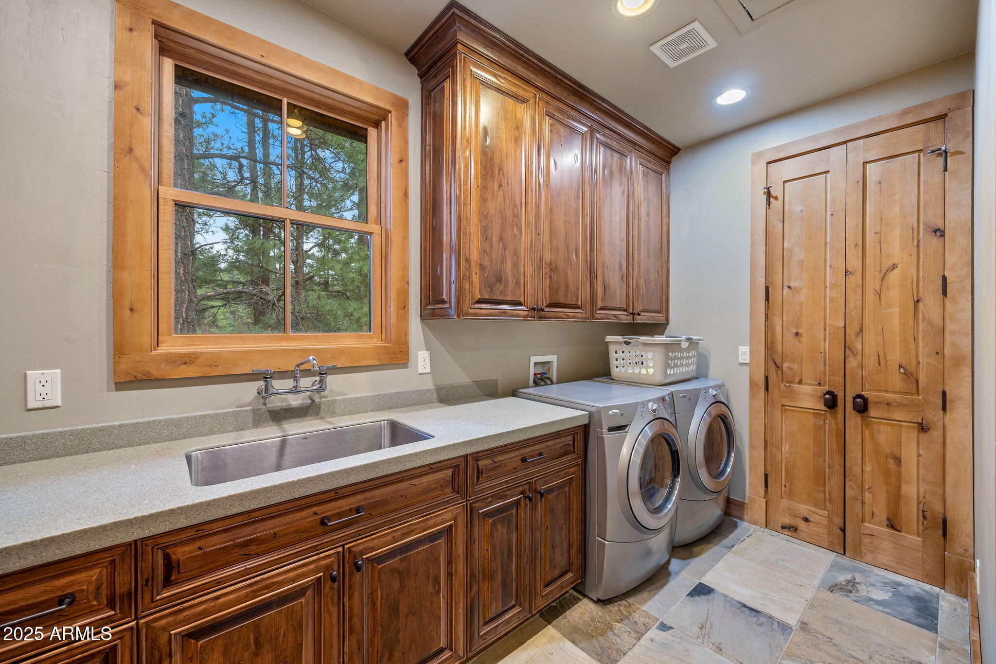 36 County Road N2147 Alpine, AZ 85920 - Photo 29 of 47 a utility room with stainless steel appliances a sink and a window