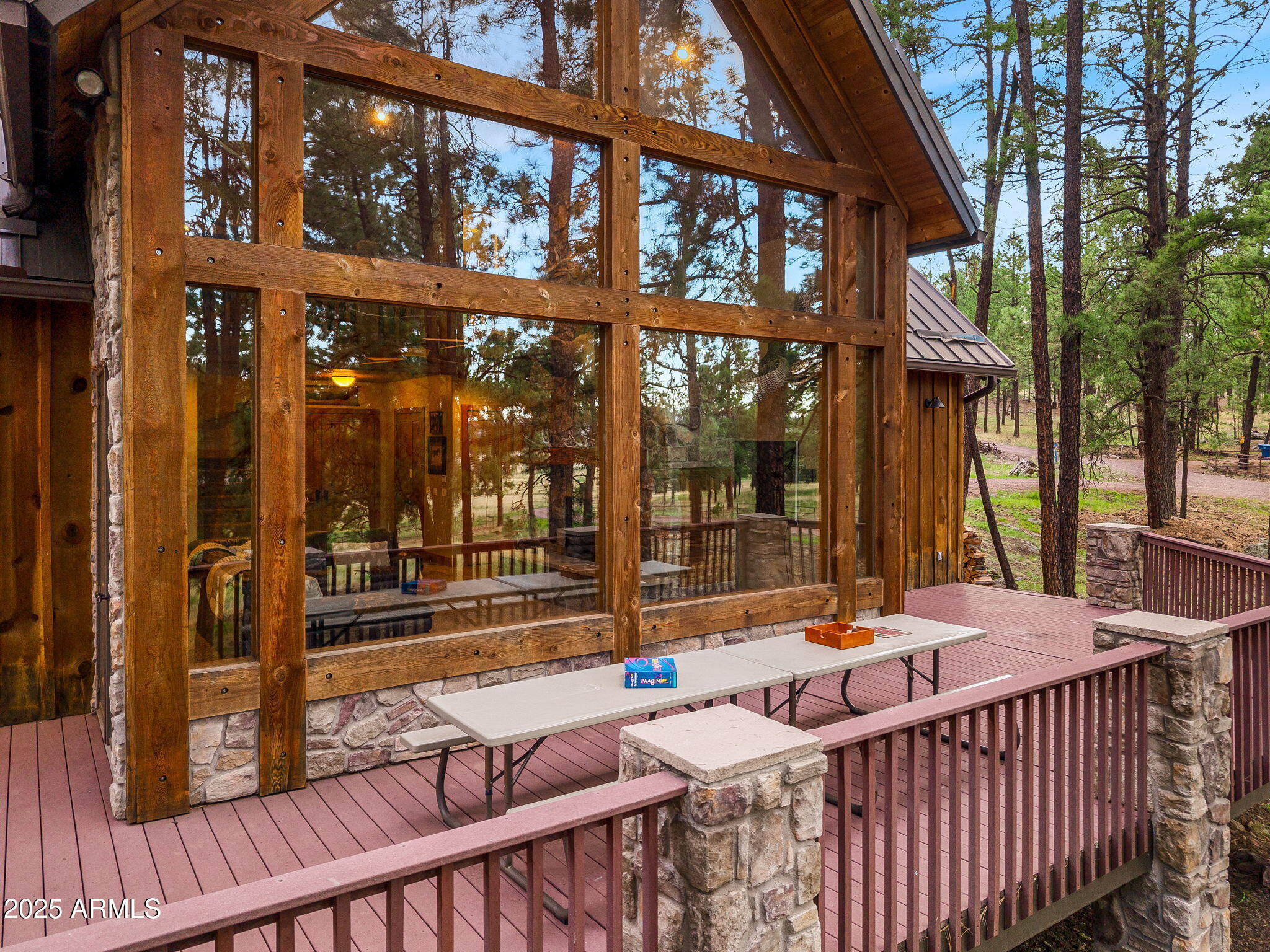36 County Road N2147 Alpine, AZ 85920 - Photo 33 of 47 a view of a patio with a table and chairs