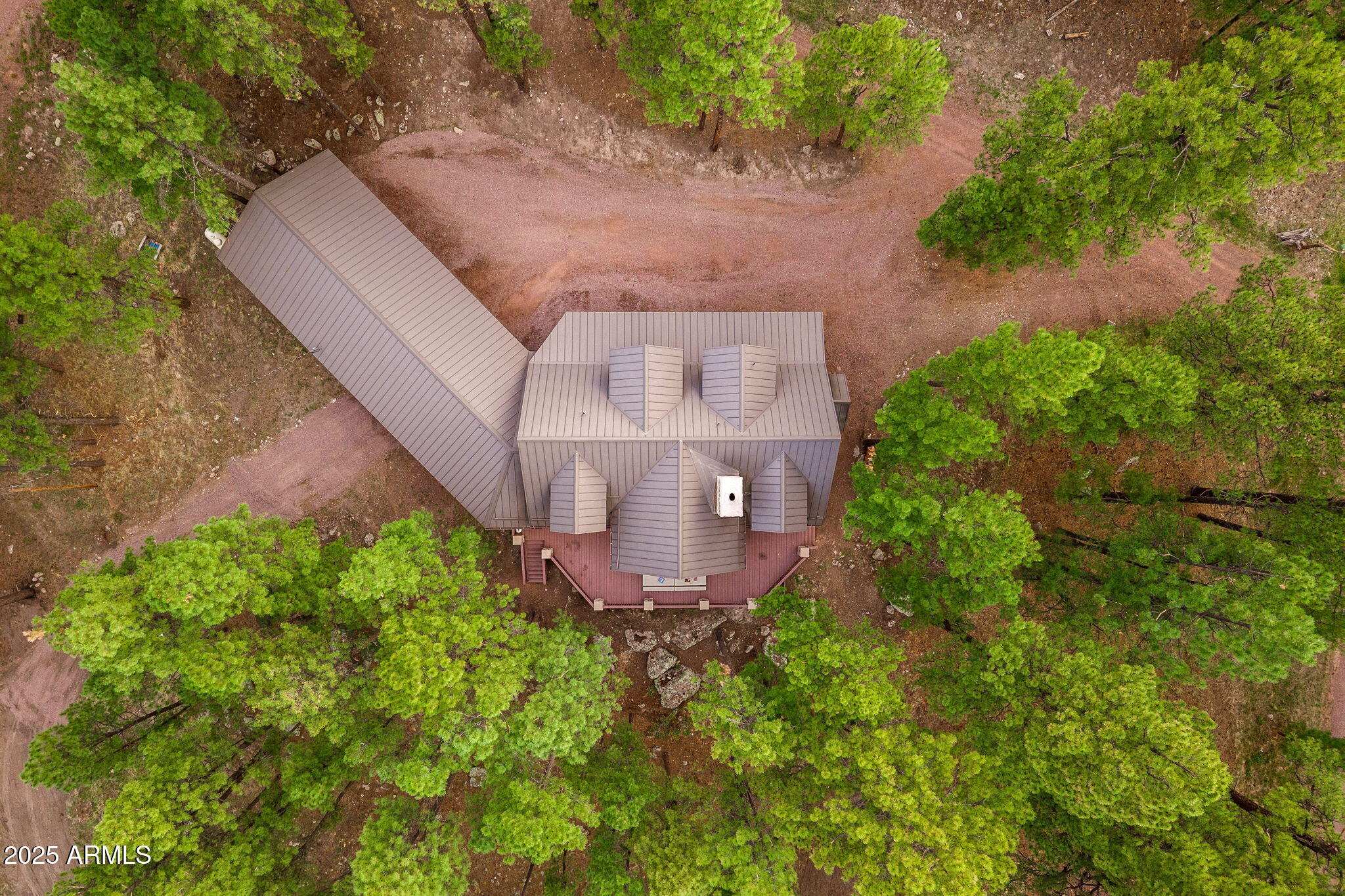 36 County Road N2147 Alpine, AZ 85920 - Photo 42 of 47 an aerial view of a house with a garden and a yard
