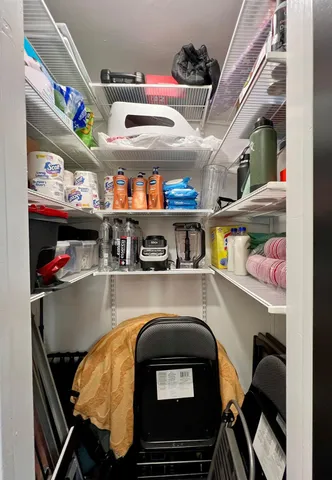 a kitchen with a refrigerator a stove and a sink