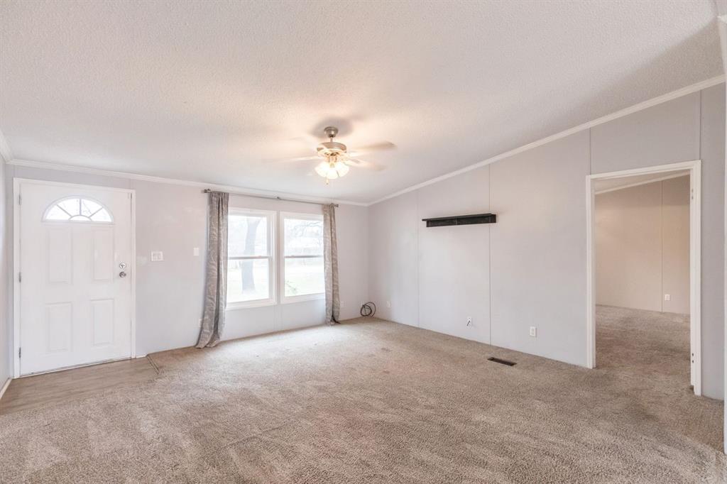 717 Marlin Street Clyde, TX 79510 - Photo 12 of 37 a view of an empty room with a window