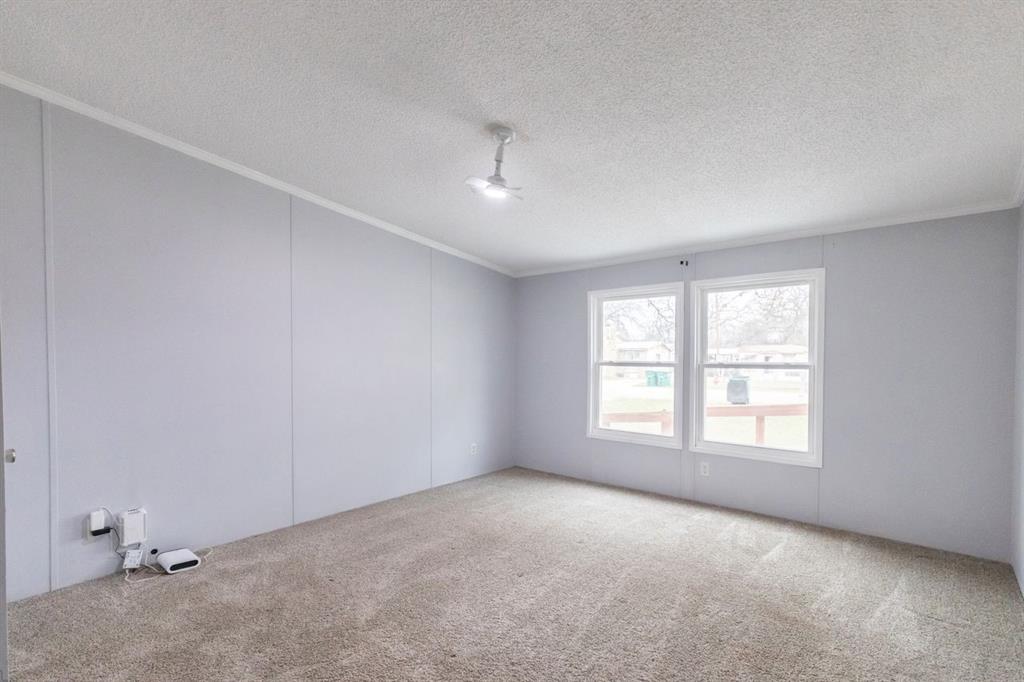 717 Marlin Street Clyde, TX 79510 - Photo 29 of 37 an empty room with a window
